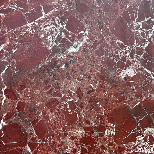details of red marble with white veining
